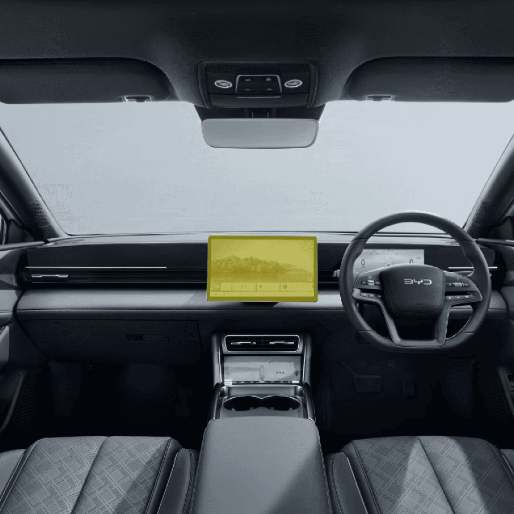 Interior view of BYD SEAL with paint protection film kit on dashboard and steering wheel.
